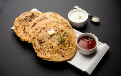 Whole Wheat Aloo Pyaj Paratha With Curd